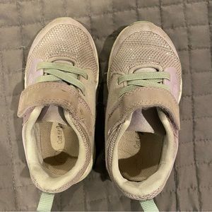 Purple and mint tennis shoes